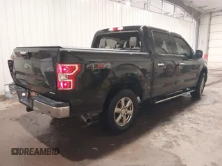 2018 Ford F-150 XL with VIN 1FTEW1EP1JKF22383, listed as a IAAI auction lot 42316339 with 113,052 mi miles and . Bid and sale history available at DreamBid. Image 4.