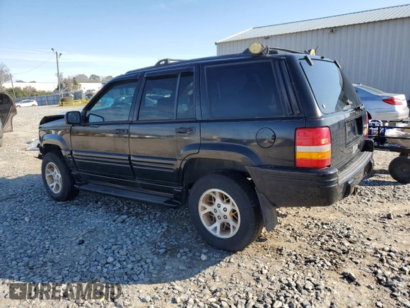 1997 Jeep Grand Cherokee Limited with VIN 1J4GZ78Y1VC598820, listed as a Copart auction lot 46398505 with 259,241 mi miles and Salvage Title. Bid and sale history available at carsss.com. Image 2.