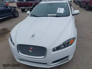2014 Jaguar XF V6 SC with VIN SAJWJ0EF3E8U10192, listed as a IAAI auction lot 41925001 with 1 mi miles. Bid and sale history available at carsss.com. Image 6.