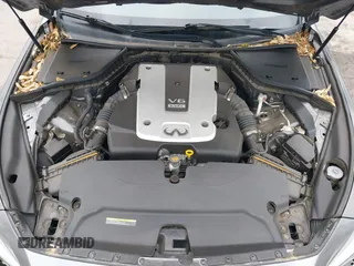 2015 Infiniti Q50 Premium z VIN JN1BV7AR7FM408015, wystawiony jako IAAI lot #42083301 z przebiegiem 58 817 mil mil oraz . Historia ofert i sprzedaży dostępna na DreamBid. Obrazek 10.