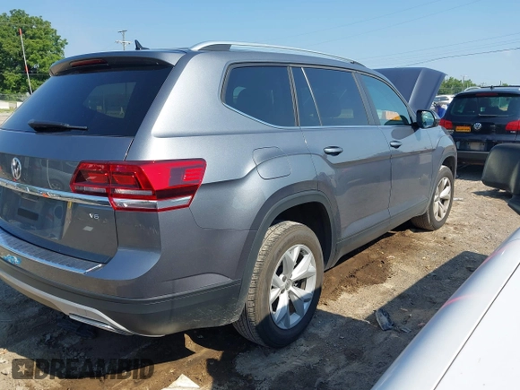 2019 Volkswagen Atlas SE with VIN 1V2WR2CA4KC620074, listed as a IAAI auction lot 42657399 with 75,306 mi miles and . Bid and sale history available at DreamBid. Image 4.