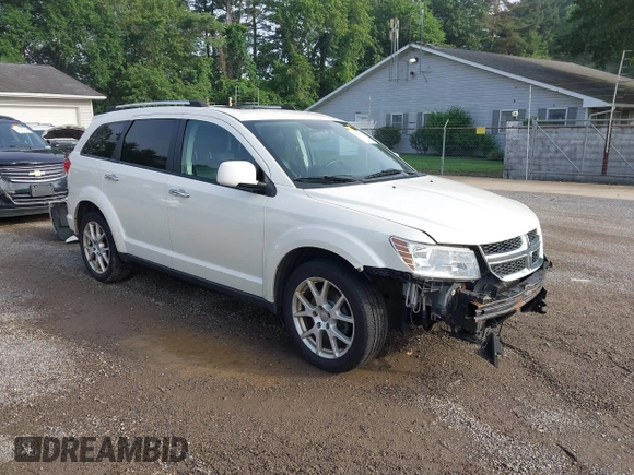 2013 Dodge Journey Crew with VIN 3C4PDCDG0DT591533, listed as a IAAI auction lot 42630548 with 164,961 mi miles and . Bid and sale history available at DreamBid. Image 1.