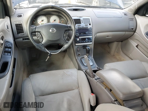 2003 Nissan Maxima SE z VIN JN1DA31A33T434264, wystawiony jako Copart lot #42189665 z przebiegiem 230 582 mil mil oraz Czysty tytuł • Clean title. Historia ofert i sprzedaży dostępna na DreamBid. Obrazek 8.