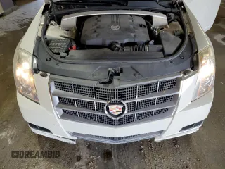 2011 Cadillac CTS Luxury z VIN 1G6DG5EY6B0127401, wystawiony jako Copart lot #57079285 z przebiegiem 125 882 mil mil oraz Szkoda całkowita • Salvage title. Historia ofert i sprzedaży dostępna na DreamBid. Obrazek 11.