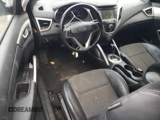 2013 Hyundai Veloster w/Gray Int с VIN KMHTC6AD3DU164555, выставлен на аукционе Copart как лот 54487605 с пробегом 146 134 миль миль и Списание • Salvage title. История ставок и продаж доступна на DreamBid. Изображение 8.
