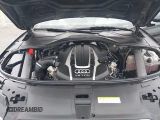 2015 Audi A8 L 4.0T with VIN WAU32AFD4FN033471, listed as a IAAI auction lot 42120112 with 174,882 mi miles. Bid and sale history available at carsss.com. Image 10.