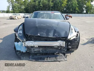 2016 Nissan 370Z with VIN JN1AZ4EH9GM937094, listed as a Copart auction lot 64554473 with 73,958 mi miles. Bid and sale history available at carsss.com. Image 5.