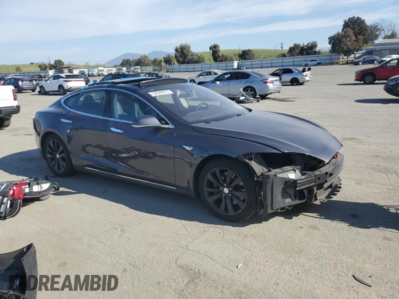 2015 Tesla Model S 85D with VIN 5YJSA1S2XFF092318, listed as a Copart auction lot 52026615 with 78,729 mi miles and Salvage Title. Bid and sale history available at carsss.com. Image 4.
