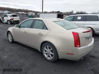 2009 Cadillac CTS AWD w/1SA with VIN 1G6DG577790121184, listed as a IAAI auction lot 41739559 with 156,379 mi miles. Bid and sale history available at carsss.com. Image 3.