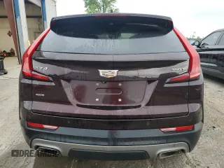 2020 Cadillac XT4 AWD Premium Luxury z VIN 1GYFZDR41LF025434, wystawiony jako Copart lot #55169805 z przebiegiem Nie podano mil oraz Szkoda całkowita • Salvage title. Historia ofert i sprzedaży dostępna na DreamBid. Obrazek 6.