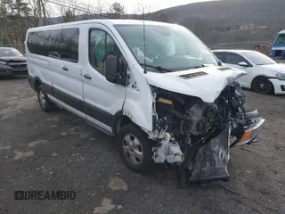 2019 Ford Transit Passenger XL z VIN 1FBZX2ZM2KKB63281, wystawiony jako IAAI lot #41859263 z przebiegiem 39 294 mil mil oraz . Historia ofert i sprzedaży dostępna na DreamBid. Obrazek 1.