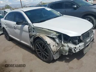 2017 Ford Taurus SEL z VIN 1FAHP2E80HG133388, wystawiony jako IAAI lot #41935352 z przebiegiem 117 770 mil mil oraz . Historia ofert i sprzedaży dostępna na DreamBid. Obrazek 1.