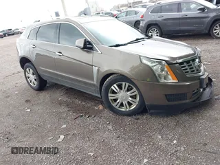 2014 Cadillac SRX Luxury Collection z VIN 3GYFNEE32ES661521, wystawiony jako IAAI lot #42310800 z przebiegiem 179 996 mil mil oraz . Historia ofert i sprzedaży dostępna na DreamBid. Obrazek 1.