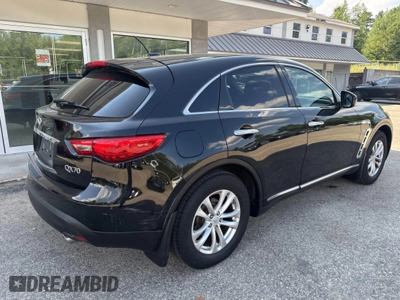 2014 Infiniti QX70 with VIN JN8CS1MW1EM411715, listed as a IAAI auction lot 42769793 with 180,472 mi miles and . Bid and sale history available at DreamBid. Image 4.