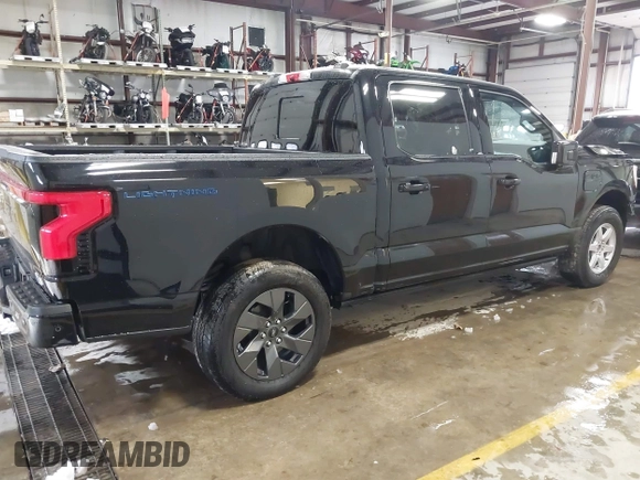 2023 Ford F-150 Lightning Pro with VIN 1FTVW1EV5PWG59228, listed as a IAAI auction lot 40838790 with Not Provided miles and . Bid and sale history available at DreamBid. Image 4.