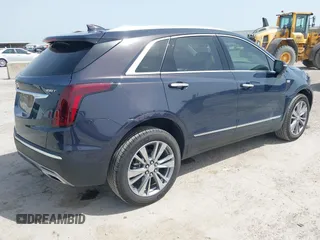 2024 Cadillac XT5 FWD Premium Luxury with VIN 1GYKNCR41RZ738779, listed as a IAAI auction lot 42266837 with 3,166 mi miles and . Bid and sale history available at DreamBid. Image 4.