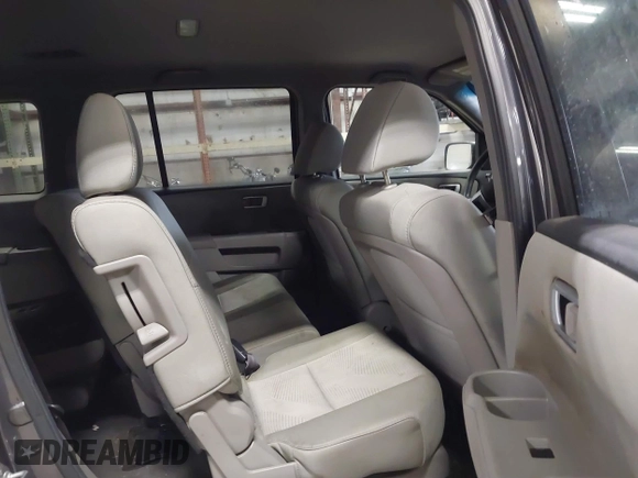 2012 Honda Pilot LX with VIN 5FNYF4H21CB085788, listed as a IAAI auction lot 41690873 with 125,165 mi miles and . Bid and sale history available at carsss.com. Image 8.