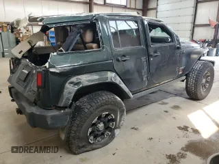 2012 Jeep Wrangler Unlimited Rubicon with VIN 1C4HJWFG4CL119390, listed as a Copart auction lot 60026425 with 305,189 mi miles and Salvage title. Bid and sale history available at DreamBid. Image 3.