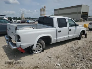 2004 Dodge Dakota SLT with VIN 1D7HL48K14S719751, listed as a Copart auction lot 64031654 with 288,226 mi miles and Salvage Title. Bid and sale history available at DreamBid. Image 3.