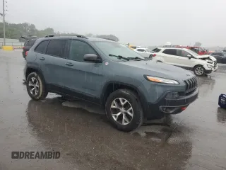 2014 Jeep Cherokee Trailhawk z VIN 1C4PJMBS7EW236960, wystawiony jako Copart lot #57098695 z przebiegiem 159 065 mil mil oraz Czysty tytuł • Clean title. Historia ofert i sprzedaży dostępna na DreamBid. Obrazek 4.