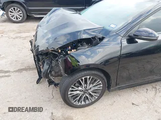 2023 Kia Forte GT-Line z VIN 3KPF54AD8PE542078, wystawiony jako IAAI lot #42113560 z przebiegiem 29 373 mil mil oraz . Historia ofert i sprzedaży dostępna na DreamBid. Obrazek 6.