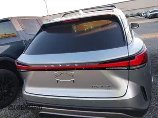 2024 Lexus RX 350h z VIN 2T2BBMCAXRC036064, wystawiony jako IAAI lot #41344207 z przebiegiem 9389 mil mil oraz . Historia ofert i sprzedaży dostępna na DreamBid. Obrazek 17.