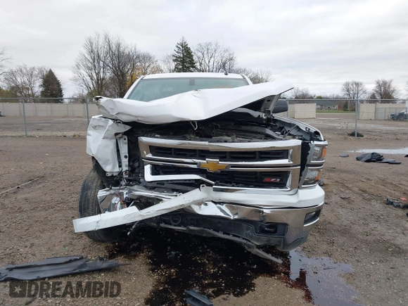 2014 Chevrolet Silverado 1500 LT with VIN 1GCVKREC2EZ390061, listed as a IAAI auction lot 40824477 with 140,928 mi miles and . Bid and sale history available at DreamBid. Image 12.