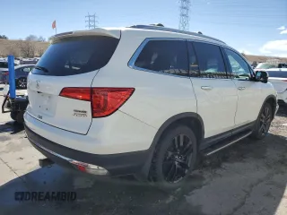 2017 Honda Pilot Touring with VIN 5FNYF6H91HB007611, listed as a Copart auction lot 47217175 with 107,349 mi miles and Salvage Title. Bid and sale history available at DreamBid. Image 3.