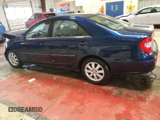 2004 Toyota Camry LE with VIN 4T1BF32K64U072368, listed as a Copart auction lot 51821965 with 136,646 mi miles and Salvage Title. Bid and sale history available at DreamBid. Image 2.