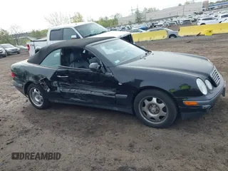 1999 Mercedes-Benz CLK with VIN WDBLK65G1XT013704, listed as a IAAI auction lot 42115880 with 85,741 mi miles. Bid and sale history available at carsss.com. Image 6.