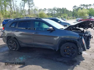 2016 Jeep Cherokee Latitude with VIN 1C4PJMCS9GW103845, listed as a IAAI auction lot 41933274 with 177,472 mi miles and . Bid and sale history available at carsss.com. Image 14.