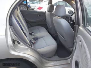2001 Kia Rio with VIN KNADC123716042067, listed as a IAAI auction lot 41449479 with 113,108 mi miles. Bid and sale history available at carsss.com. Image 8.