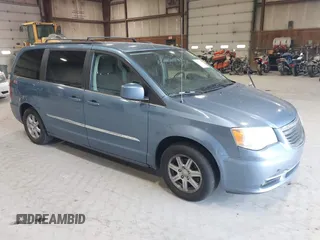 2011 Chrysler Town & Country Touring with VIN 2A4RR5DG4BR779844, listed as a IAAI auction lot 42167693 with 272,502 mi miles and . Bid and sale history available at DreamBid. Image 1.