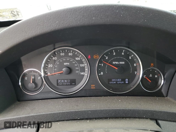 2009 Jeep Grand Cherokee Laredo with VIN 1J8GR48K89C500719, listed as a Copart auction lot 51425085 with 127,896 mi miles and Salvage Title. Bid and sale history available at carsss.com. Image 9.