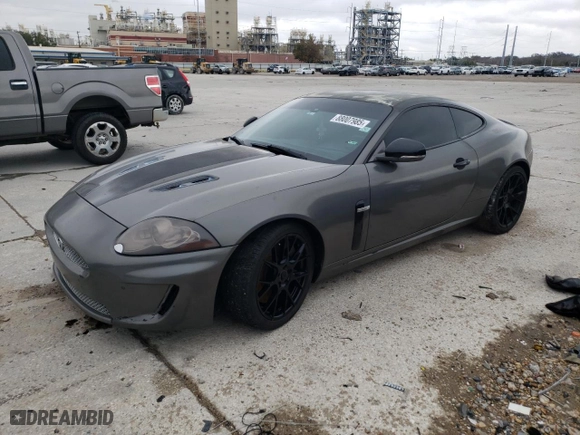 2011 Jaguar XK with VIN SAJWA4DC7BMB40355, listed as a Copart auction lot 88007985 with 0 mi miles and Salvage Title. Bid and sale history available at carsss.com. Image 1.