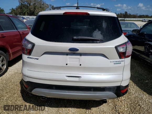 2017 Ford Escape Titanium with VIN 1FMCU0JD1HUA20454, listed as a Copart auction lot 74551324 with 0 mi miles and Non Repairable. Bid and sale history available at carsss.com. Image 6.
