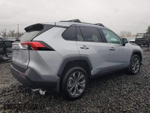 2024 Toyota RAV4 Hybrid XLE Premium with VIN 2T3B6RFV6RW066043, listed as a Copart auction lot 43470115 with 9,454 mi miles and Salvage Title. Bid and sale history available at DreamBid. Image 3.