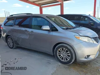 2011 Toyota Sienna XLE AAS with VIN 5TDYK3DC1BS007820, listed as a IAAI auction lot 41935200 with 123,554 mi miles. Bid and sale history available at carsss.com. Image 13.