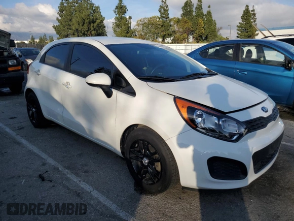 2015 Kia Rio LX with VIN KNADM5A39F6460207, listed as a Copart auction lot 44464245 with 106,792 mi miles and Salvage Title. Bid and sale history available at carsss.com. Image 4.