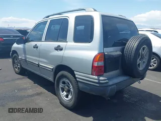 2002 Chevrolet Tracker z VIN 2CNBE13C426951703, wystawiony jako IAAI lot #42177942 z przebiegiem 186 096 mil mil oraz . Historia ofert i sprzedaży dostępna na DreamBid. Obrazek 12.