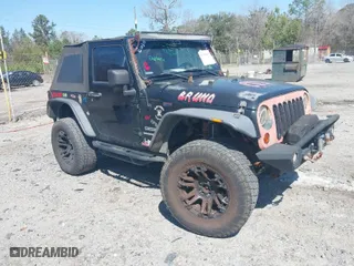 2010 Jeep Wrangler Mountain with VIN 1J4AA2D10AL120620, listed as a IAAI auction lot 41785857 with 173,040 mi miles. Bid and sale history available at carsss.com. Image 1.