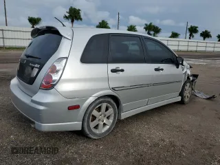 2006 Suzuki Aerio Premium z VIN JS2RC62H265351207, wystawiony jako Copart lot #74980534 z przebiegiem 64 199 mil mil oraz Nie do naprawy. Historia ofert i sprzedaży dostępna na DreamBid. Obrazek 3.