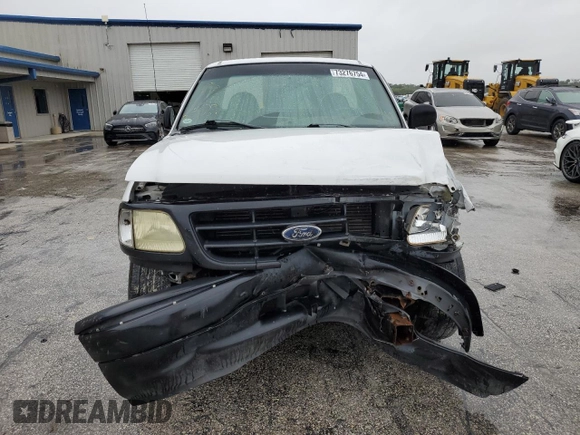 2002 Ford F-150 XL with VIN 1FTRF17W32NB86385, listed as a Copart auction lot 73276754 with 100,817 mi miles and Salvage Title. Bid and sale history available at carsss.com. Image 5.