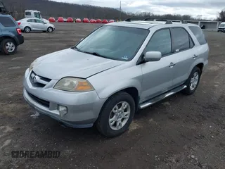 2006 Acura MDX Touring RES w/Navi with VIN 2HNYD18926H511319, listed as a IAAI auction lot 41802256 with 216,637 mi miles. Bid and sale history available at carsss.com. Image 2.
