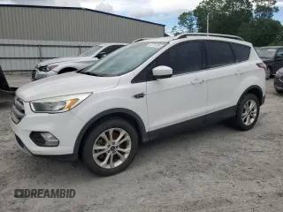 2017 Ford Escape SE z VIN 1FMCU0G99HUA75866, wystawiony jako Copart lot #57274785 z przebiegiem 132 874 mil mil oraz Czysty tytuł • Clean title. Historia ofert i sprzedaży dostępna na DreamBid. Obrazek 1.