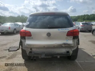 2013 Volkswagen Tiguan S z VIN WVGAV3AX2DW616476, wystawiony jako Copart lot #55313615 z przebiegiem 129 105 mil mil oraz Szkody całkowita. Historia ofert i sprzedaży dostępna na DreamBid. Obrazek 6.