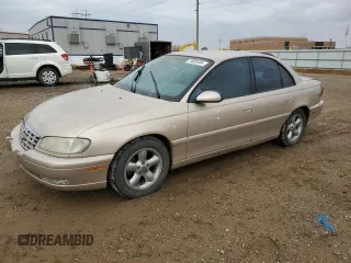 1998 Cadillac Catera z VIN W06VR52R5WR028774, wystawiony jako Copart lot #78085484 z przebiegiem 104 609 mil mil oraz Szkody całkowita. Historia ofert i sprzedaży dostępna na DreamBid. Obrazek 1.
