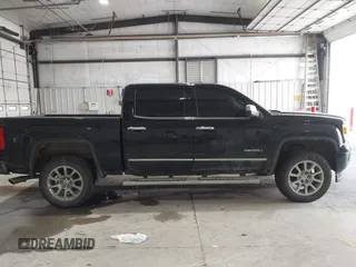 2015 GMC Sierra 1500 Denali z VIN 3GTU2WEJ8FG321045, wystawiony jako IAAI lot #41790541 z przebiegiem 239 945 mil mil oraz . Historia ofert i sprzedaży dostępna na DreamBid. Obrazek 13.