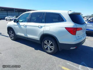 2016 Honda Pilot EX with VIN 5FNYF6H32GB078939, listed as a IAAI auction lot 41641358 with 126,138 mi miles. Bid and sale history available at carsss.com. Image 3.