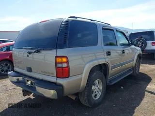2003 Chevrolet Tahoe LT with VIN 1GNEK13Z93J329737, listed as a IAAI auction lot 42212884 with 232,514 mi miles and . Bid and sale history available at DreamBid. Image 4.